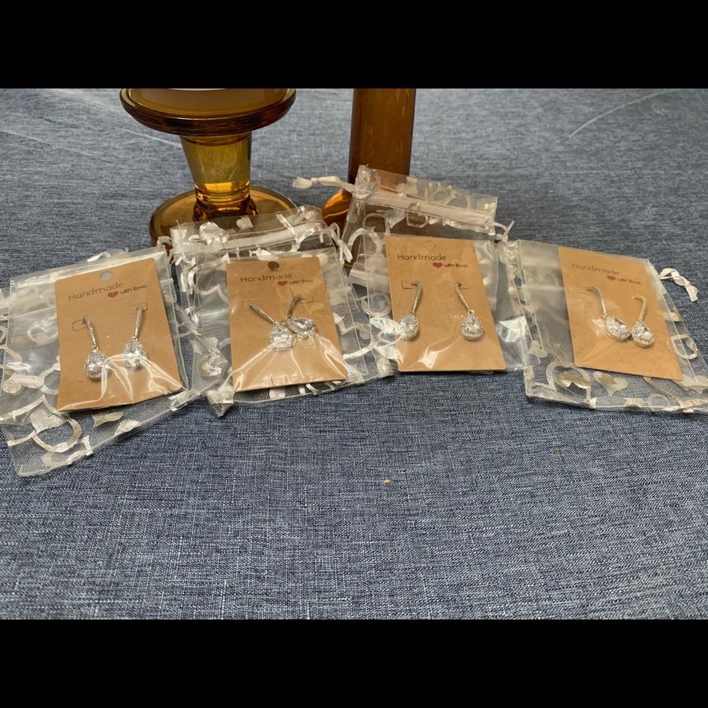 4 sets of year drop earrings